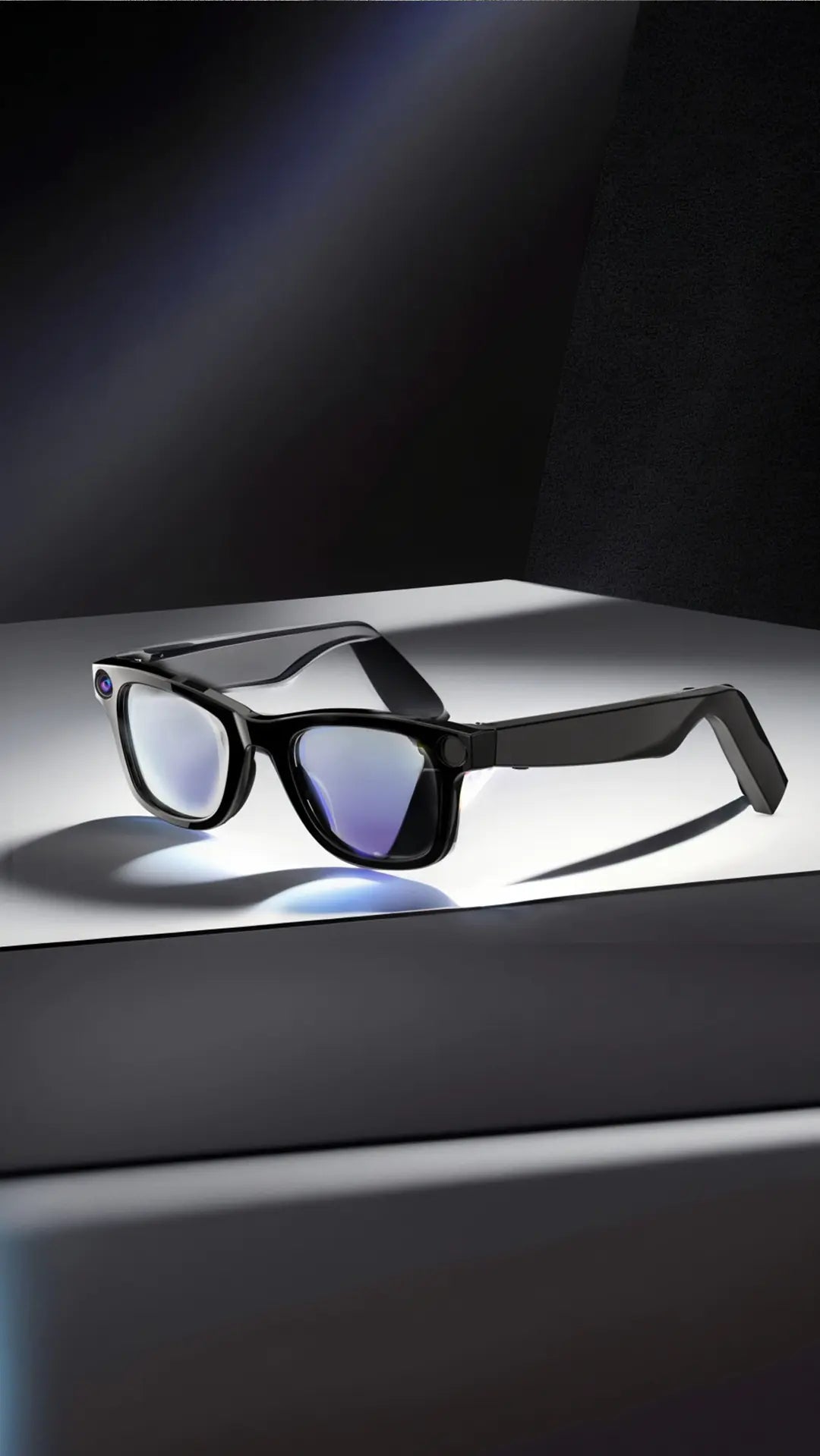 Black sunglasses with blue-tinted lenses on a reflective surface with a dark background